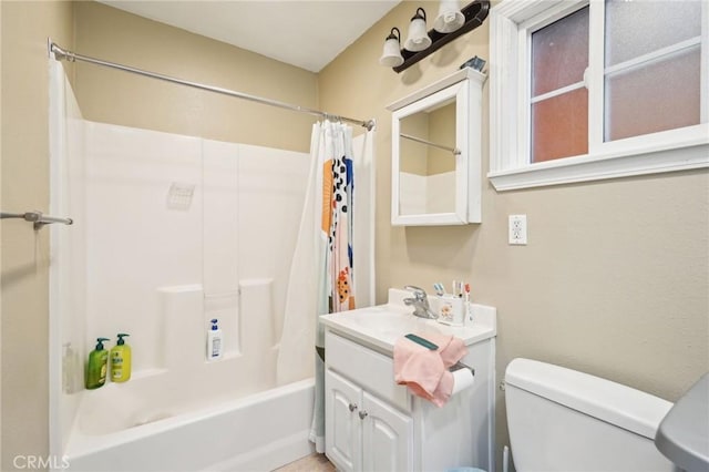 full bathroom with toilet, shower / tub combo with curtain, and vanity