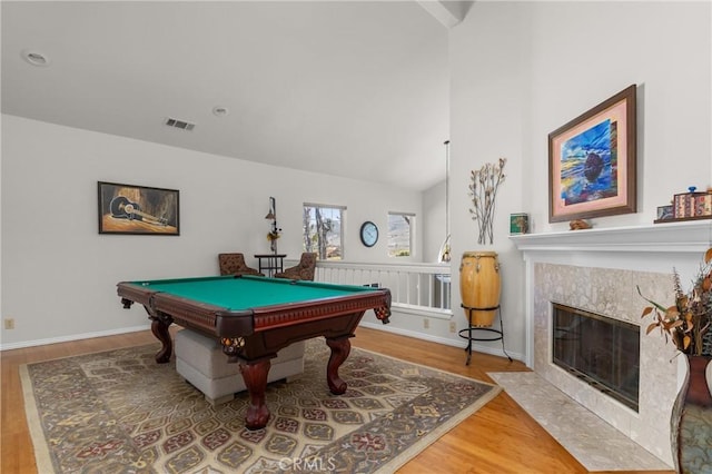 744 Clearview Ln, San Luis Obispo, CA 93405 - game room with wood finished floors, billiards table, a premium fireplace, baseboards, and vaulted ceiling