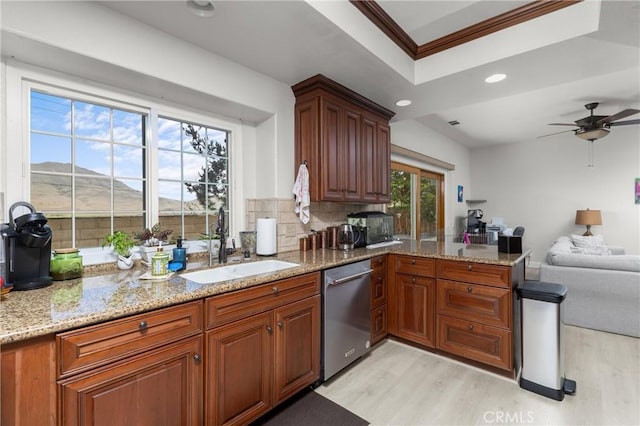 744 Clearview Ln, San Luis Obispo, CA 93405 - kitchen with stainless steel dishwasher, light wood finished floors, a sink, ceiling fan, and a peninsula