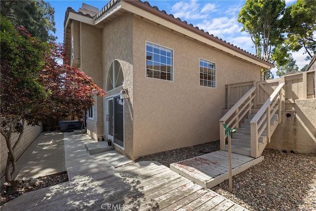 744 Clearview Ln, San Luis Obispo, CA 93405 - back of property featuring stucco siding, fence, a wooden deck, and a patio area