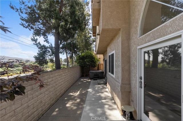 744 Clearview Ln, San Luis Obispo, CA 93405 - view of property exterior featuring stucco siding, fence, and a patio