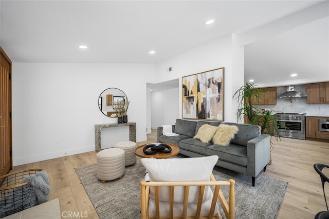 16009 Jalon Rd, La Mirada, CA 90638 - living room featuring recessed lighting, light wood-style flooring, and baseboards