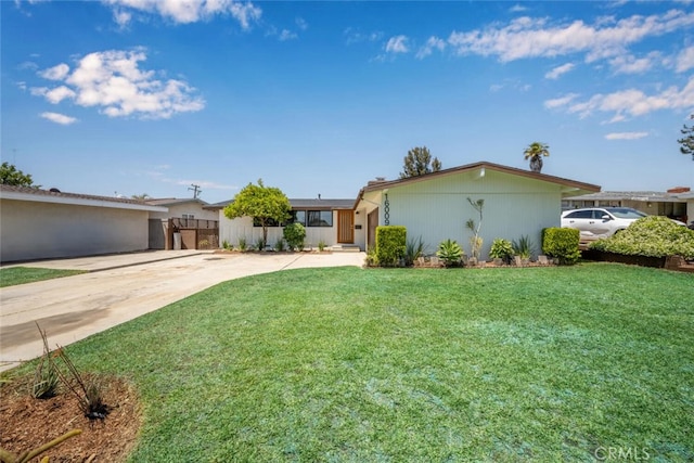 16009 Jalon Rd, La Mirada, CA 90638 - view of front of home with driveway, a front yard, and a garage