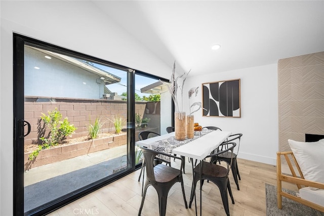 16009 Jalon Rd, La Mirada, CA 90638 - dining room featuring light wood-style floors, an accent wall, baseboards, and recessed lighting