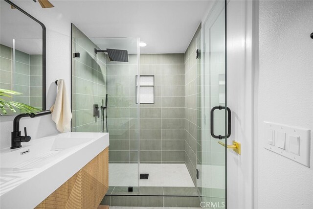 16009 Jalon Rd, La Mirada, CA 90638 - bathroom with a shower stall, vanity, and recessed lighting