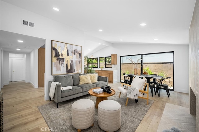 16009 Jalon Rd, La Mirada, CA 90638 - living area featuring light wood-style flooring, lofted ceiling, recessed lighting, and baseboards