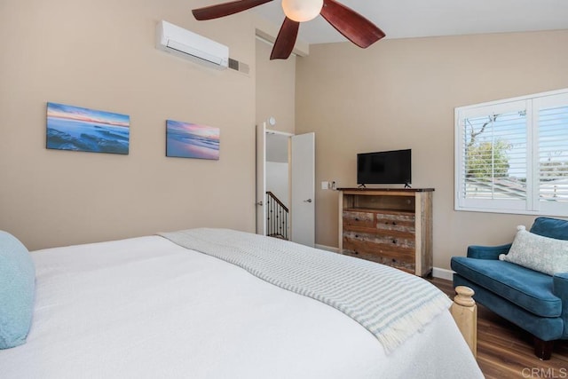1715 Kennington Rd, Encinitas, CA 92024 - bedroom with a wall unit AC, wood finished floors, baseboards, a ceiling fan, and lofted ceiling