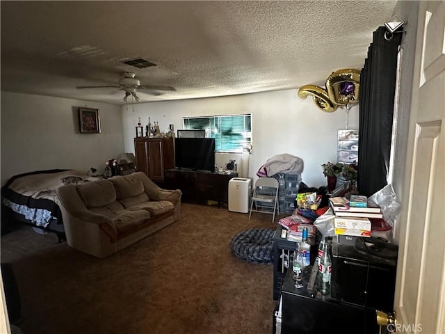 351 Armory Rd, Barstow, CA 92311 - carpeted living room with a ceiling fan and a textured ceiling