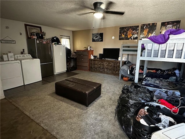 351 Armory Rd, Barstow, CA 92311 - bedroom with independent washer and dryer, a textured ceiling, freestanding refrigerator, and a ceiling fan