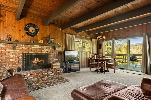 383 Golf Course Rd, Lake Arrowhead, CA 92352 - living room with carpet floors, beam ceiling, a chandelier, wood ceiling, and wood walls