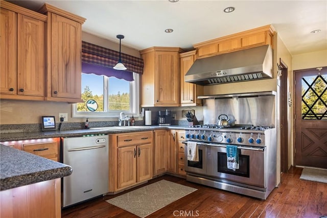 383 Golf Course Rd, Lake Arrowhead, CA 92352 - kitchen featuring wall chimney range hood, appliances with stainless steel finishes, a sink, dark wood-style floors, and recessed lighting
