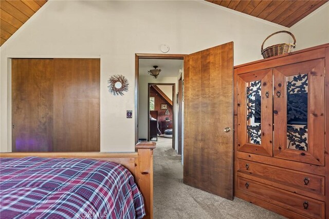 383 Golf Course Rd, Lake Arrowhead, CA 92352 - carpeted bedroom with vaulted ceiling, wooden ceiling, and a closet