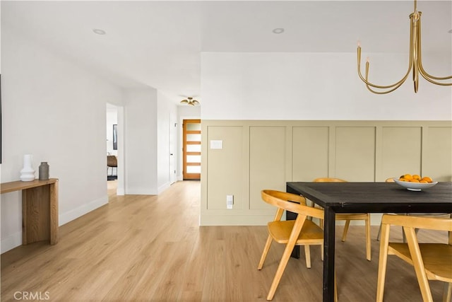 6340 Charlwood St, Lakewood, CA 90713 - dining space featuring a decorative wall and light wood-type flooring