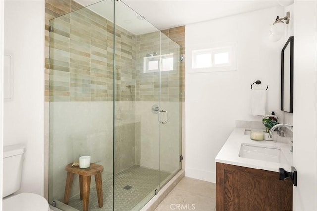 6340 Charlwood St, Lakewood, CA 90713 - bathroom with a shower stall, toilet, vanity, and tile patterned floors