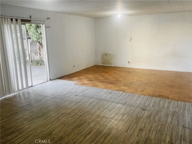 132 W Norwood Pl, San Gabriel, CA 91776 - unfurnished room featuring wood finished floors and wooden walls