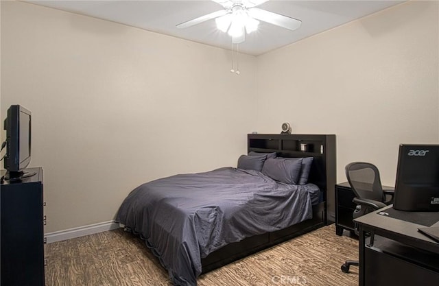 28071 Caldaro, Laguna Niguel, CA 92677 - bedroom with wood finished floors, a desk, baseboards, and a ceiling fan