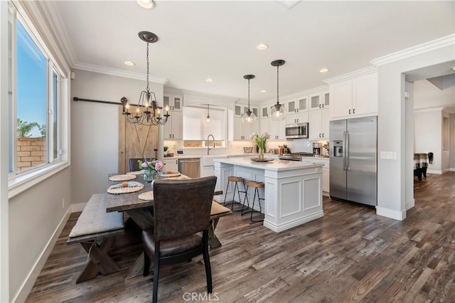 1663 Spyglass Dr, Corona, CA 92883 - dining area with dark wood-type flooring, baseboards, recessed lighting, a chandelier, and ornamental molding