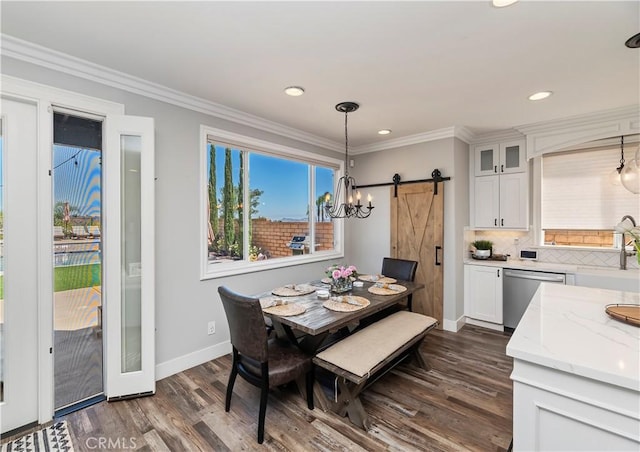 1663 Spyglass Dr, Corona, CA 92883 - dining space with a barn door, dark wood-type flooring, baseboards, a chandelier, and recessed lighting