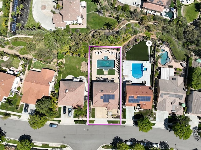 1663 Spyglass Dr, Corona, CA 92883 - aerial perspective of suburban area featuring a pool and property boundaries highlighted