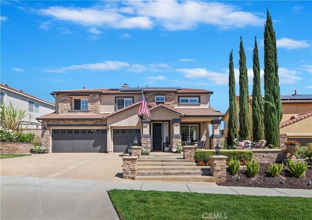 1663 Spyglass Dr, Corona, CA 92883 - view of front of house with stone siding, stucco siding, solar panels, an attached garage, and driveway