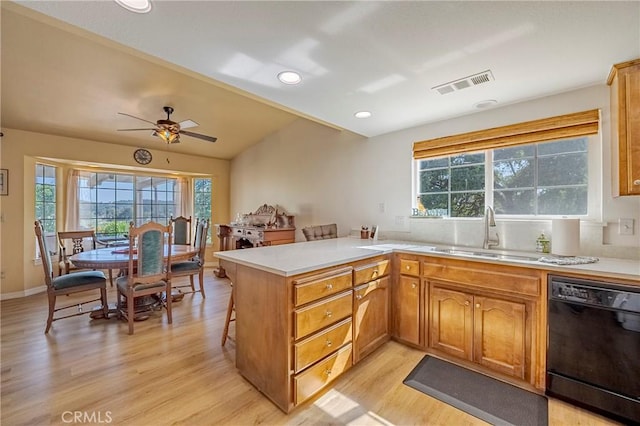 5030 Creek Front Rd, Catheys Valley, CA 95306 - kitchen with dishwasher, a sink, light wood-style flooring, light countertops, and recessed lighting