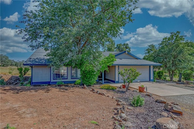 5030 Creek Front Rd, Catheys Valley, CA 95306 - view of front of home with driveway, a garage, and a shingled roof