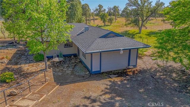 5030 Creek Front Rd, Catheys Valley, CA 95306 - view of outbuilding with an attached garage and dirt driveway