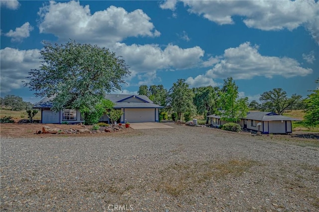 5030 Creek Front Rd, Catheys Valley, CA 95306 - view of front of home featuring a garage and driveway