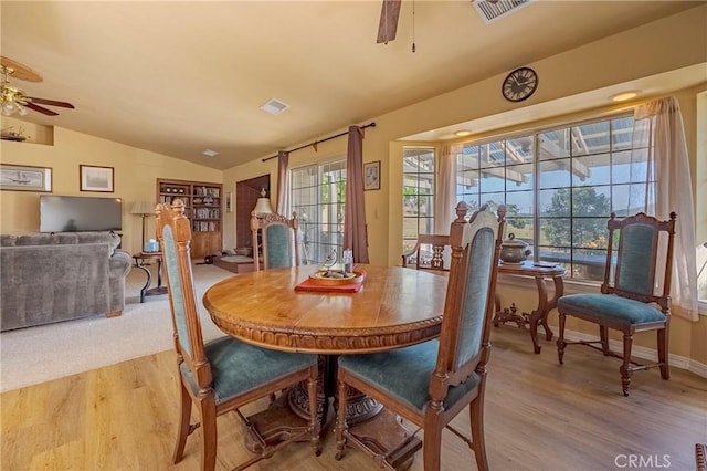5030 Creek Front Rd, Catheys Valley, CA 95306 - dining space featuring a ceiling fan, vaulted ceiling, light wood-type flooring, and baseboards