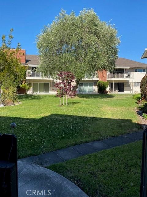 22935 Nadine Cir Unit A, Torrance, CA 90505 - view of green lawn with a balcony