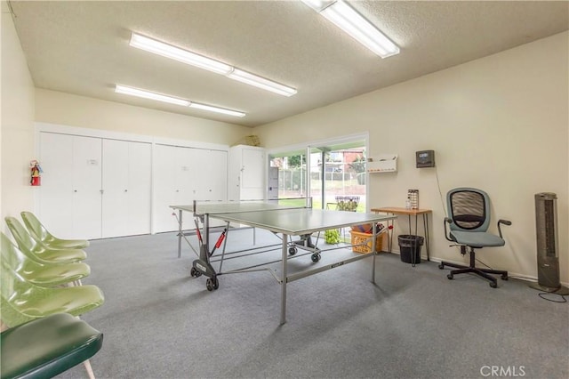 22935 Nadine Cir Unit A, Torrance, CA 90505 - recreation room featuring carpet floors, a textured ceiling, and baseboards