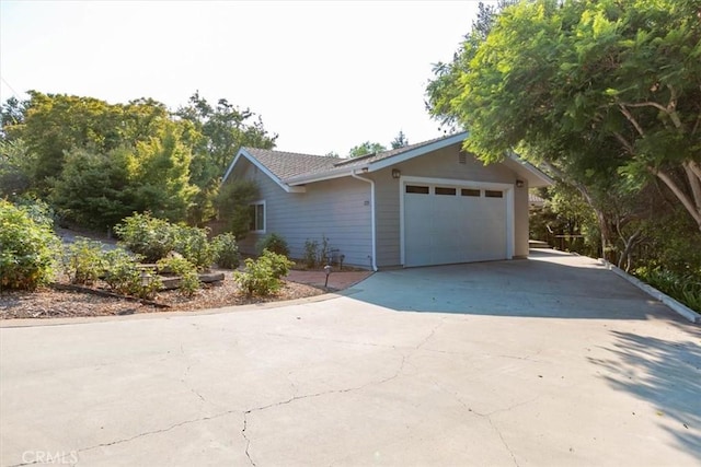 225 Hacienda Ave, San Luis Obispo, CA 93401 - view of front of house with concrete driveway and a garage