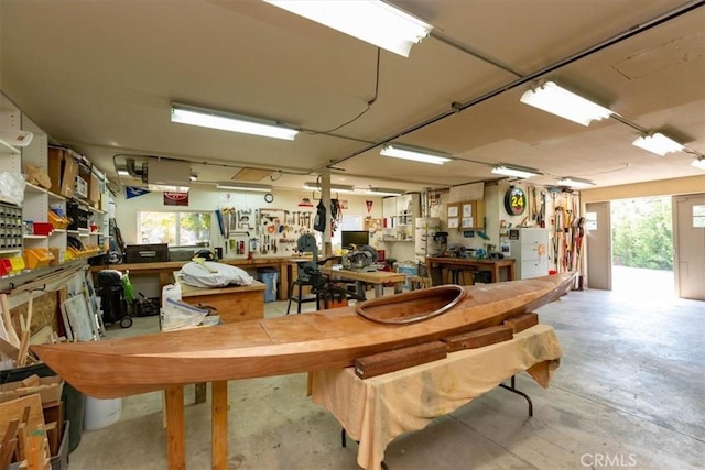 225 Hacienda Ave, San Luis Obispo, CA 93401 - miscellaneous room featuring a workshop area and concrete flooring