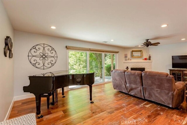 225 Hacienda Ave, San Luis Obispo, CA 93401 - living area featuring light wood-style floors, a ceiling fan, a fireplace, recessed lighting, and baseboards