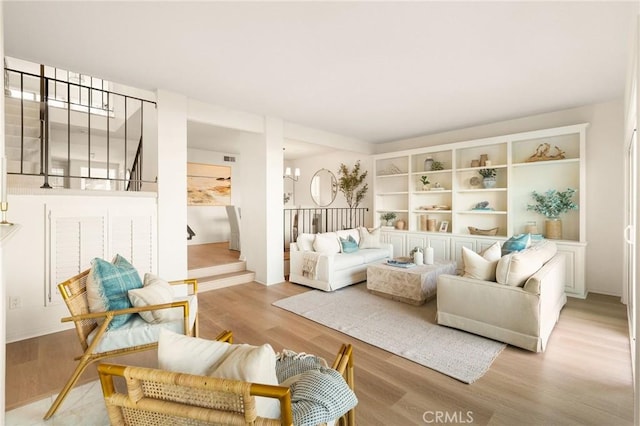 69 Cottonwood Cir, Rolling Hills Estates, CA 90274 - living area featuring light wood-type flooring and a chandelier