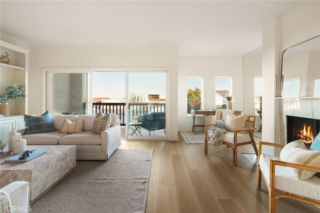 69 Cottonwood Cir, Rolling Hills Estates, CA 90274 - living area with light wood finished floors and a premium fireplace