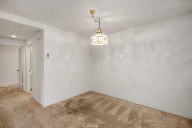 2319 Via Puerta Unit O, Laguna Woods, CA 92637 - spare room with light carpet and a textured ceiling