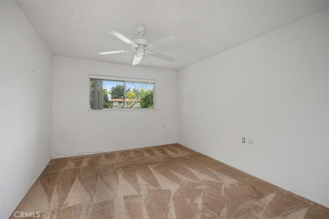 2319 Via Puerta Unit O, Laguna Woods, CA 92637 - carpeted empty room with ceiling fan and a textured ceiling