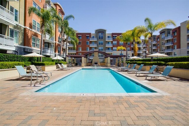 12668 Chapman Ave Unit 2403, Garden Grove, CA 92840 - community pool with a patio area