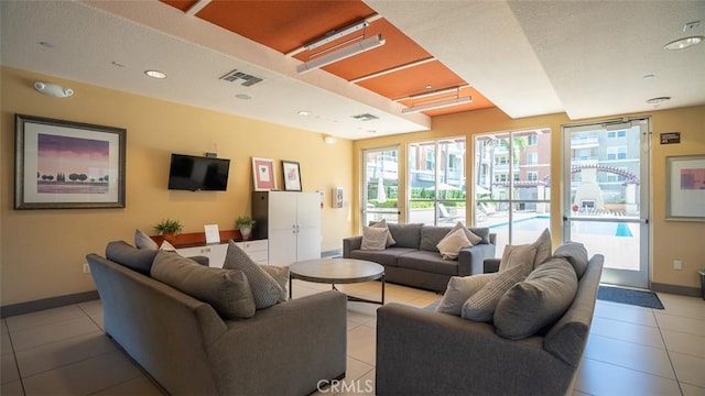 12668 Chapman Ave Unit 2403, Garden Grove, CA 92840 - living area featuring light tile patterned floors and baseboards