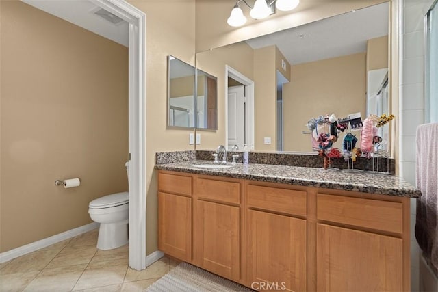 12668 Chapman Ave Unit 2403, Garden Grove, CA 92840 - bathroom with toilet, baseboards, vanity, and tile patterned floors