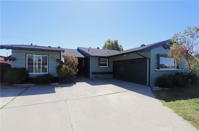 9943 Vernon Ave, Montclair, CA 91763 - ranch-style home featuring a garage and concrete driveway