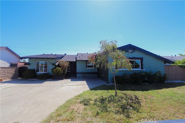 9943 Vernon Ave, Montclair, CA 91763 - single story home with concrete driveway and stucco siding