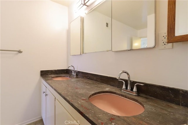 9943 Vernon Ave, Montclair, CA 91763 - bathroom featuring double vanity