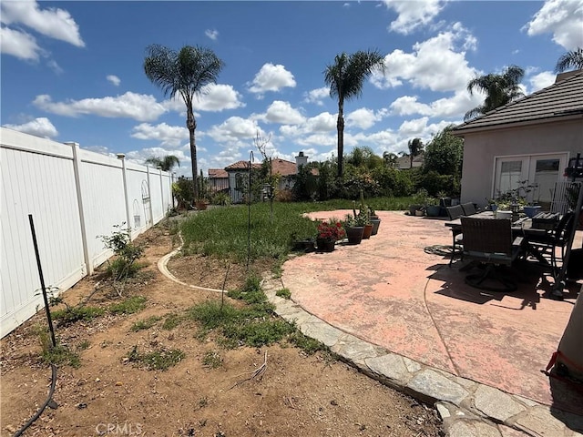 17287 Grove Dr, Riverside, CA 92503 - view of yard with a patio, fence, and outdoor dining space