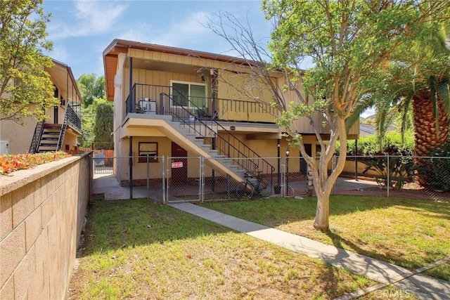 4250 10th St, Riverside, CA 92501 - view of front of house with stairs and a gate