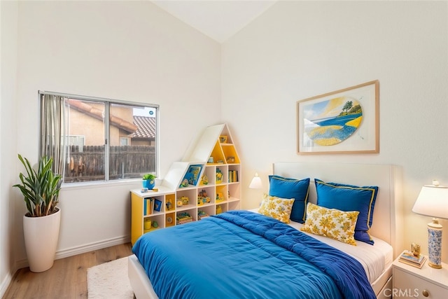43419 Olive Ave, Hemet, CA 92544 - bedroom featuring wood finished floors, vaulted ceiling, and baseboards