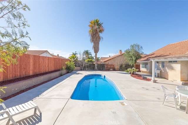 43419 Olive Ave, Hemet, CA 92544 - view of swimming pool featuring a fenced backyard and a patio area