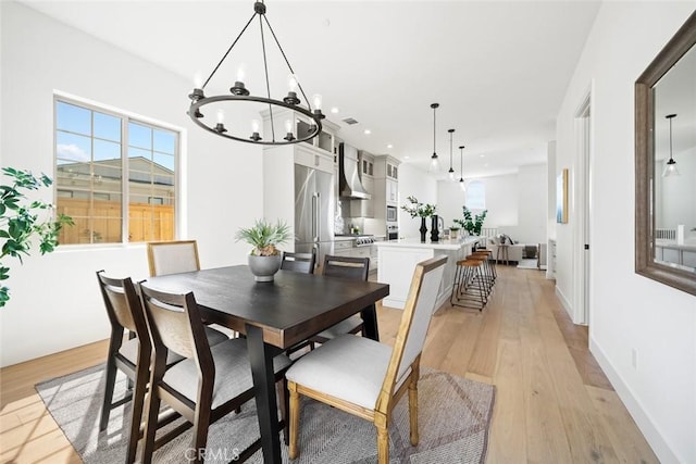 4140 Hillside Dr, San Luis Obispo, CA 93401 - dining area featuring a chandelier, light wood-type flooring, healthy amount of natural light, and recessed lighting