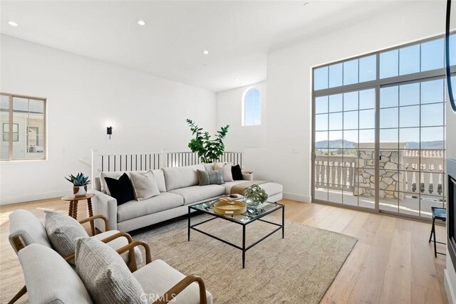 4140 Hillside Dr, San Luis Obispo, CA 93401 - living area with light wood-style flooring, baseboards, and recessed lighting